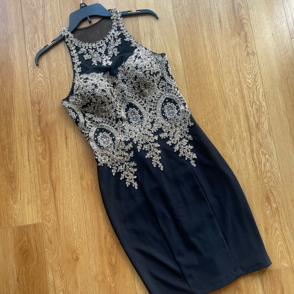 Elegant Black and Gold Embellished Dress